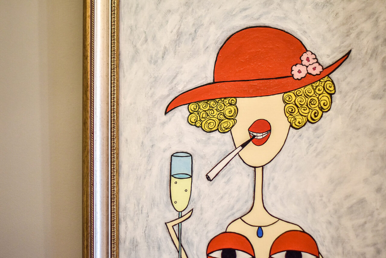 赤い帽子の女性のイラストのアート